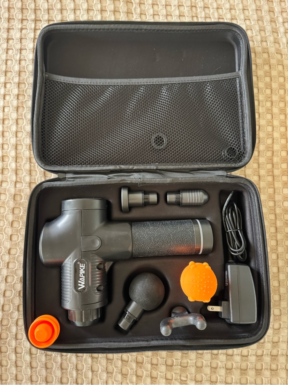 Black Percussion Massage Gun with Accessories in Carrying Case